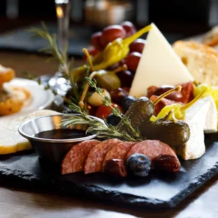 Cheese Board - three rotating cheeses, cured meats, accompaniments