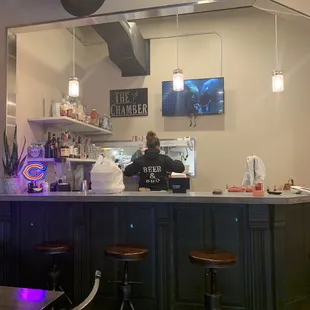 a man sitting at a bar