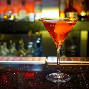 a cocktail in a martini glass