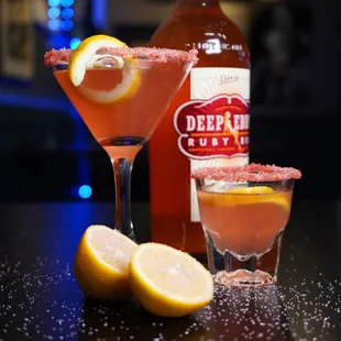 Barbie Lemondrop and Vegas Barbie Shot with a Pop Rock rim. Deep Eddie Ruby Red with Watermelon Schnapps, sweet n sour and fresh lemon.