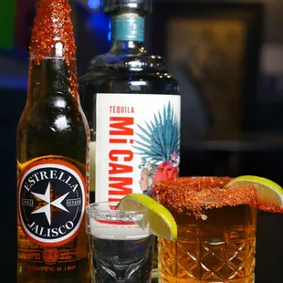 Spicy Rim Job with Estrella Jalisco Lager and Mi Campo Tequila. A spicy twist on the Boiler Maker shot and beer combo.