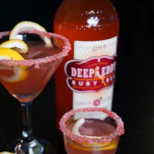 Barbie Lemondrop and Vegas Barbie Shot with a Pop Rock rim. Deep Eddie Ruby Red with Watermelon Schnapps, sweet n sour and fresh lemon.