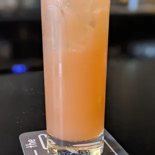 a drink in a tall glass