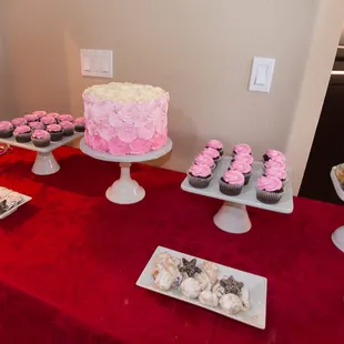 Beautiful and delicious cake, cupcakes and cookies.