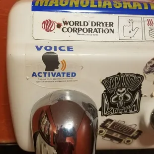 Voice activated hand dryer