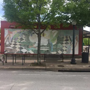 a bicycle parked at a bus stop