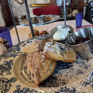 Blueberry scones with clotted cream and preserves