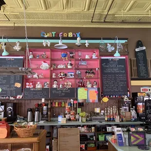 a bar with a lot of items on the shelves