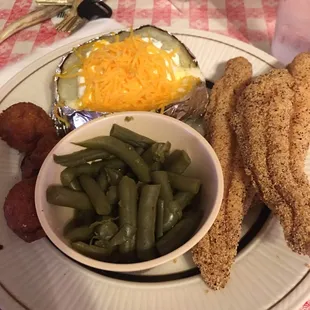 2 piece catfish with green beans and a baked potato. The catfish is so good.