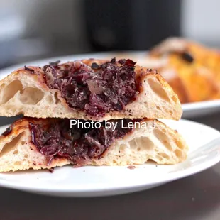 Inside of Onion and Poppy Seed Bialy ($3.25) - bread it chewy and tasty. Filling is a bit too oily for me.