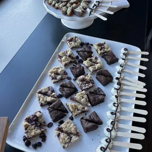 Desserts provided at our private event pizza making class. Brownies, fruit bars, mini spoons with goat cheese with chocolate