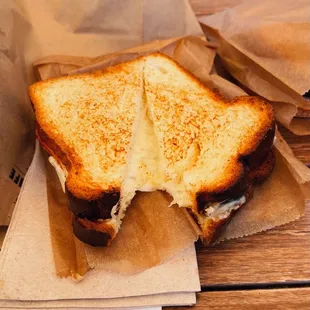 The Gooey Sandwich (Swiss, cheddar &amp; provolone on brioche) / $8.95