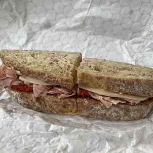 Make your own sandwich with provolone, Virginia ham, wheat bread, and house dressing