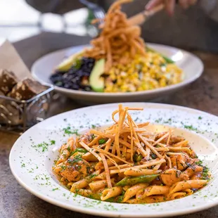 a plate of pasta and vegetables