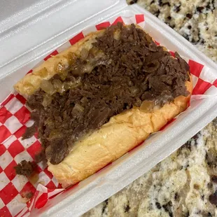 Steak and white American cheese with onions