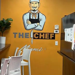 a restaurant sign painted on the wall