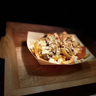 a plate of food on a cutting board