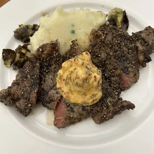 peppercorn crusted NY steak with compound butter, parsnip puree $16