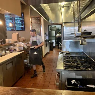 Seated at the chef&apos;s bar.