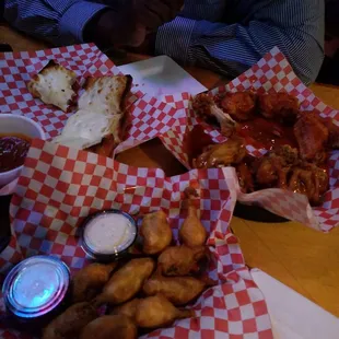 Wings &amp; garlic bread jalapeno poppers ! So yummy !