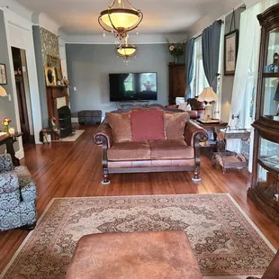 Our double parlor features cozy seating areas that can be rearranged to fit the events.