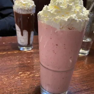 Strawberry milkshake in front, mint chip milkshake in back!