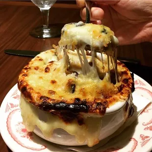 The French onion soup with a lot of cheese