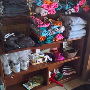 T-shirts, mugs and other merchandise available to purchase.