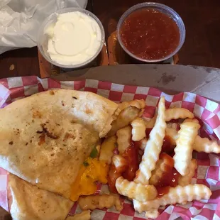 a quesadilla and french fries