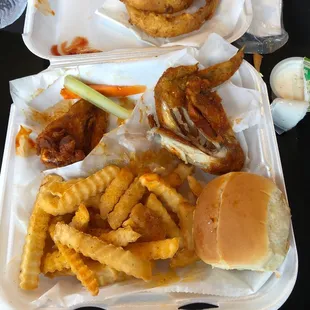 a sandwich and onion rings