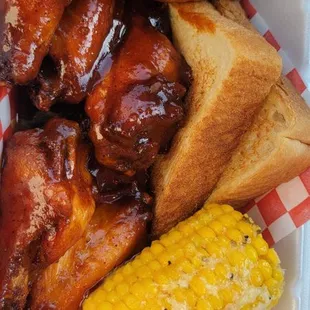6pc wings with smothered corn Taken 12.21.24