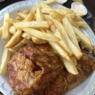 a plate of food with fries