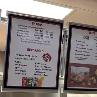 Menus and &quot;The Chicken Place&quot; restaurant sign.