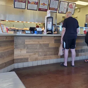 people standing at the counter