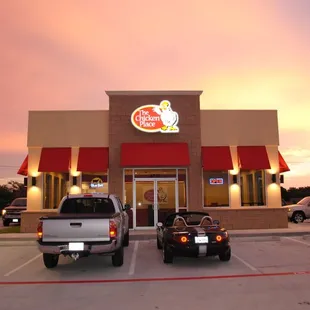 two trucks parked in front of the restaurant
