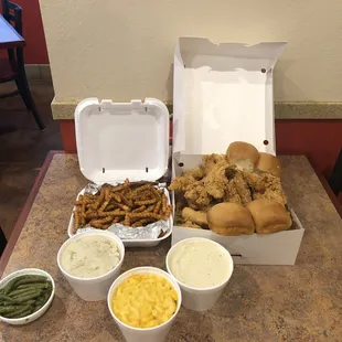 30 chicken tenders, 4 rolls, family mashed potatoes, family french fries, family mac and cheese, gravy, and regular side green beans