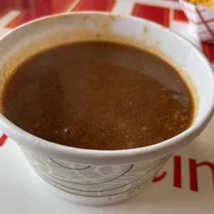 Cup of plain chili to try the straight up taste. Good but quite unique.