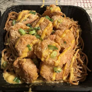 Garlic parmesan prawns over garlic noodles