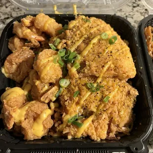 Lemon pepper salmon &amp; prawns over garlic noodles