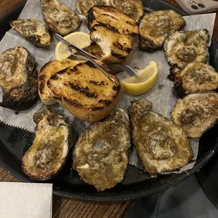 Charbroiled oysters tiny tiny oysters. Save your $26.00