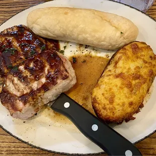 Grilled pork chops with stuffed potato