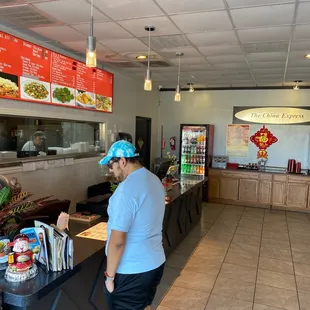 a man standing at the counter