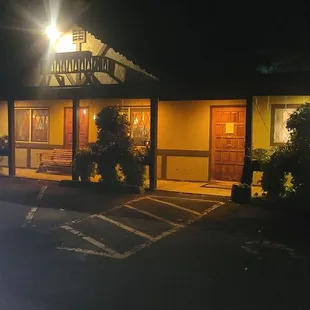 the front of the building at night