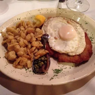 Delicious traditional Bavarian fare: Weiner Schnitzel a la Holstein, with spaetzle, a fried egg, capers and an anchovy