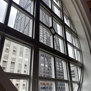 a view of a skyscraper through a window