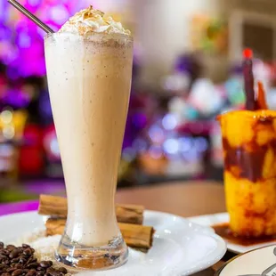  a milkshake with whipped cream and chocolate