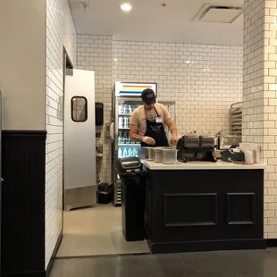 a man preparing food in the kitchen
