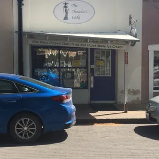 cars parked in front of the store