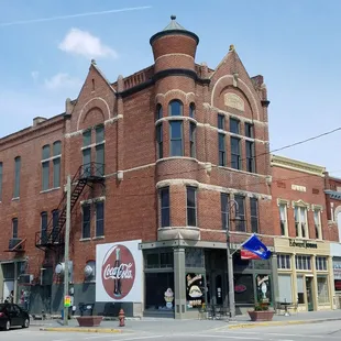 great looking building on the corner houses the restaurant in the first floor