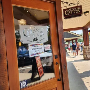 the entrance to a coffee shop